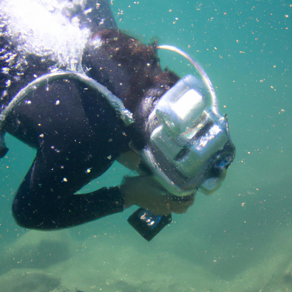 Person inspecting underwater with equipment